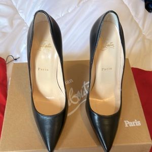 Christian Louboutin black stilettos